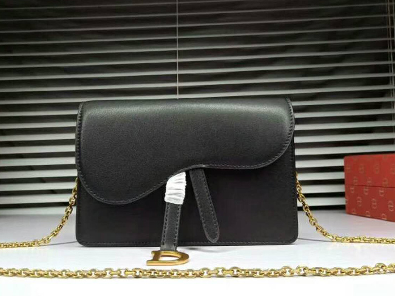 dior saddle calfskin clutch