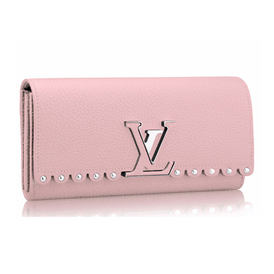Louis Vuitton on X: The metal embellishments on the Capucines wallet draw  on multiple #LouisVuitton references. See more from #LVCruise at    / X