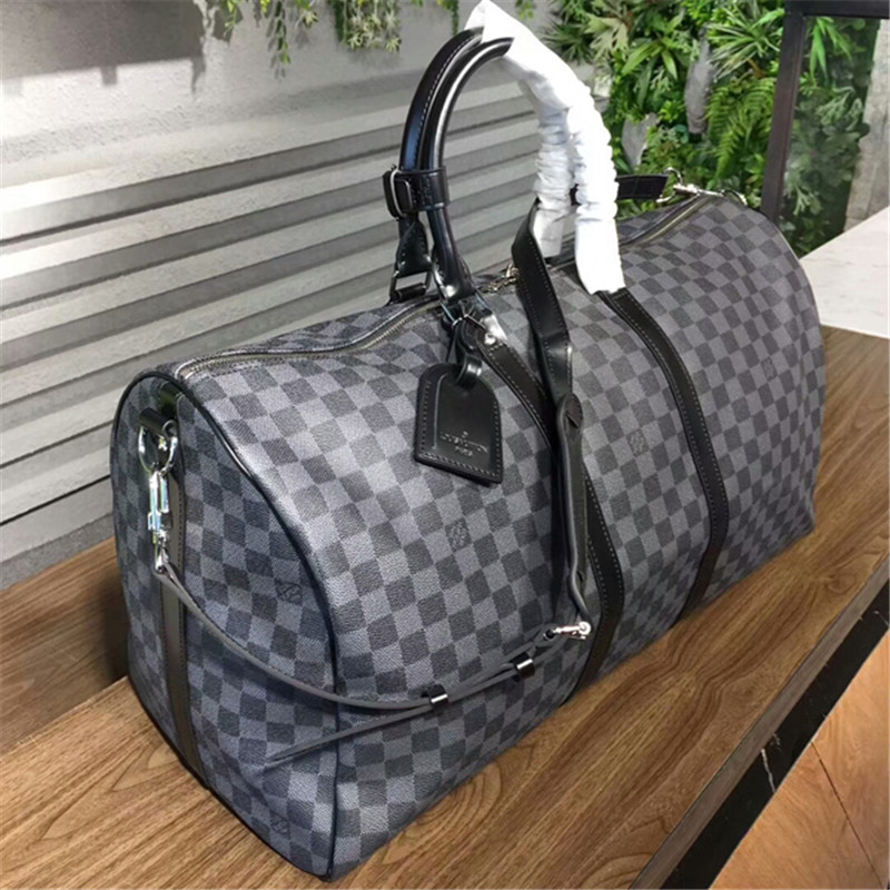 Louis Vuitton Damier Ebene Keepall 55 – Dina C's Fab and Funky Consignment  Boutique