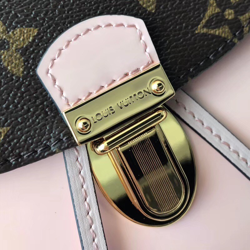 Louis Vuitton Pochette Metis de lona con monograma inverso para