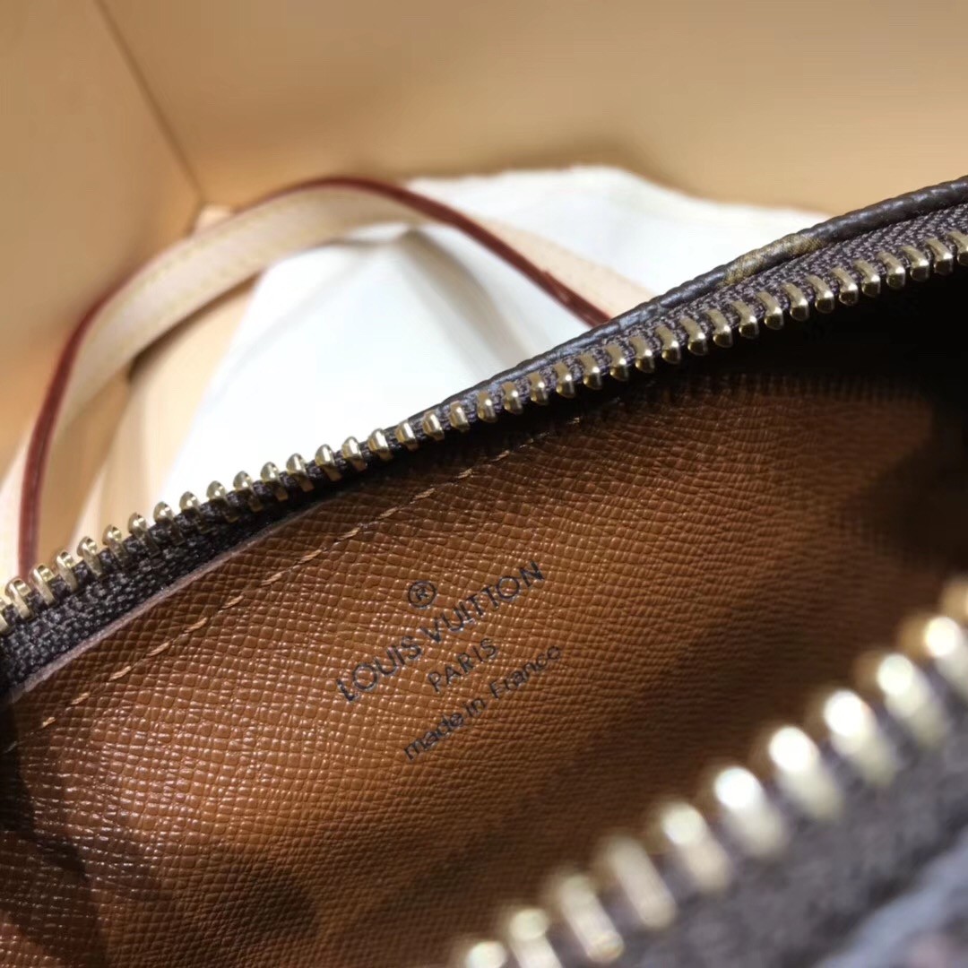 Réplique Louis Vuitton Round Drum Monogram Canvas Mini Bag avec chaîne à  vendre avec un prix bon marché au magasin de faux sacs