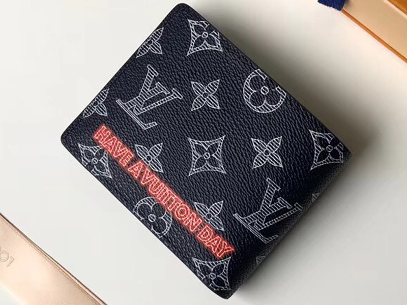 Just looking to authenticate my Louis Vuitton monogram multiple wallet.  Wallet was purchased on  from a seller with 100% positive feedback  (427) and a blue star. Seller has tons of positive